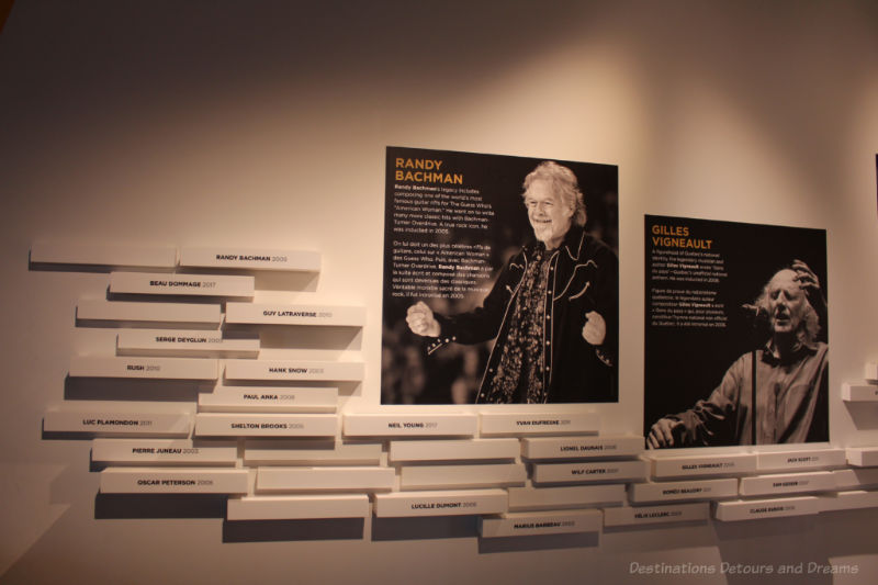 Names and photos of musicians on the wall of the Halls of Fame gallery in the National Music Centre