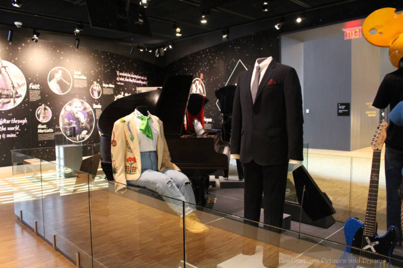 Idol and Icons display at National Music Centre Display of outfits and instruments from Canadian music icons in the National Music Centre