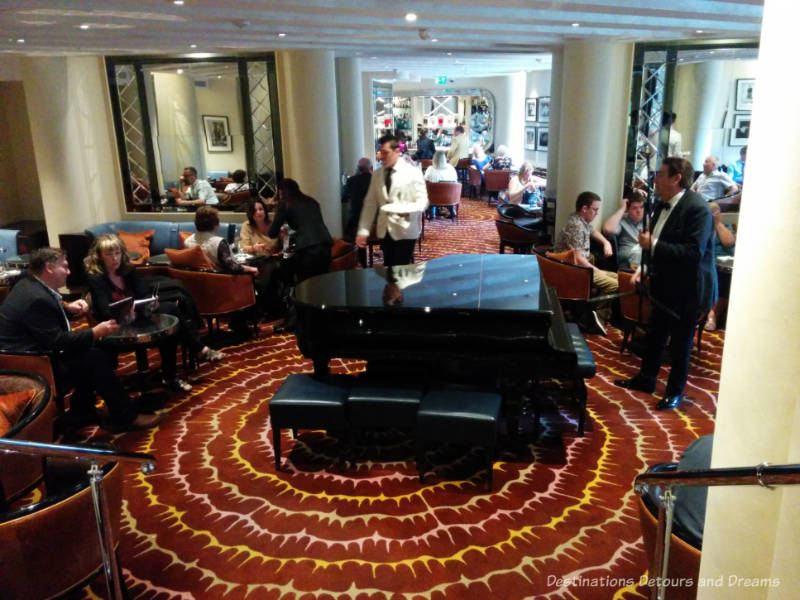 American Bar Piano Grand piano in the centre of the room at the American Bar in London's Savoy Hotel