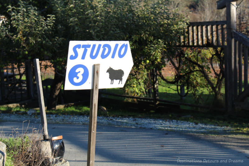 Studio 3 sign along side of road indicating a stop on a self-guided studio tour on Salt Spring Island