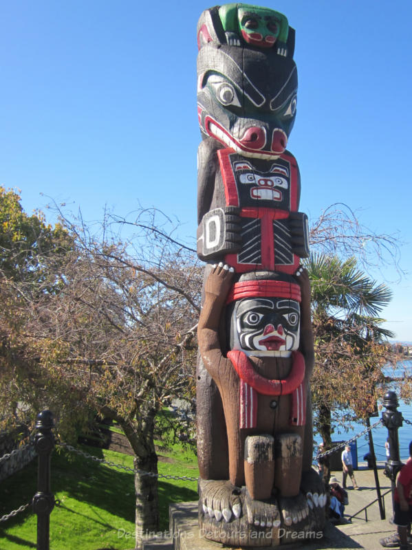 Totem pole alongside Victoria Inner Harbour