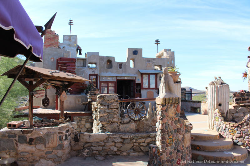 Quirky rustic entrance with stone covered walls to Mystery Castle in Phoenix