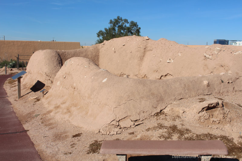 Mound ruins of an ancient Hohokam settlement with signage indicating what the building had been used for at Pueblo Grande Museum and Archaeological Park