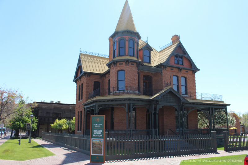 Victoria era three-story brick house with veranda and round turret at one end - Rosson House in Phoenix