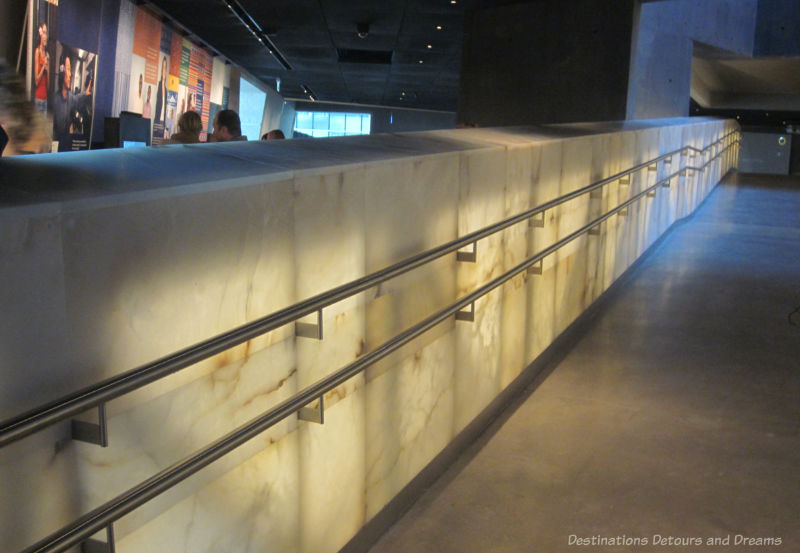 Alabaster LED-lit ramp between gallery floors at CMHR
